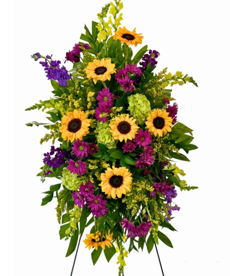 Sunflower sympathy spray on an easel