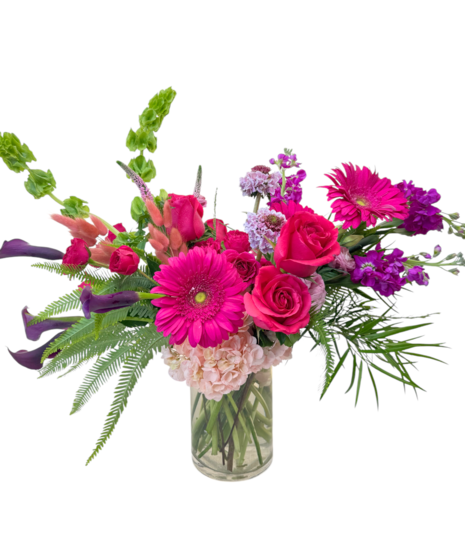 Bright and colorful arrangement featuring roses, callas and more.