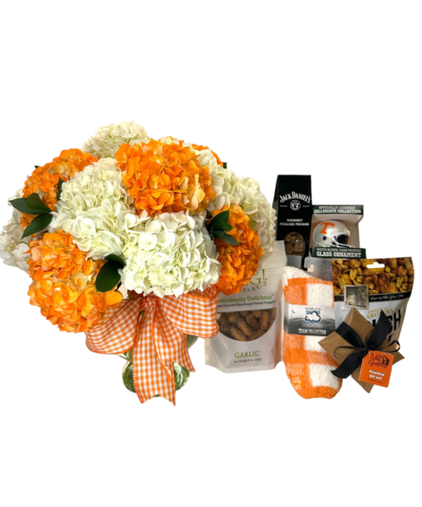 Cluster of hydrangeas in a vase tied with ribbon