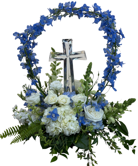 Heavenly bouquet of white flowers with a crystal cross in the center.